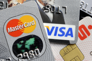 Visa、萬事達同意降低刷卡費用 美商家五年省300億美元